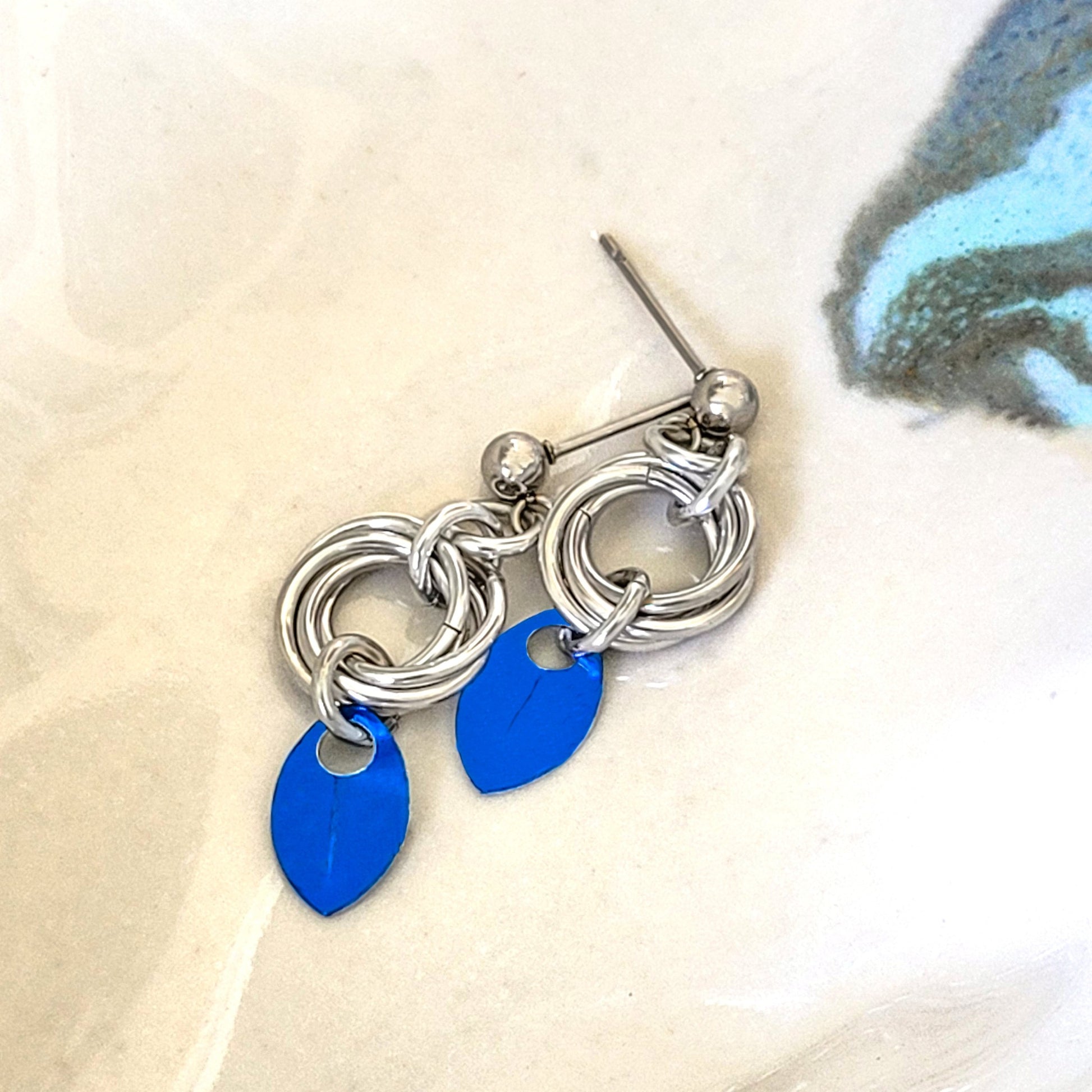 Blue baby scales and bright silver aluminum mobius love knot chainmail earrings with stainless steel ear post